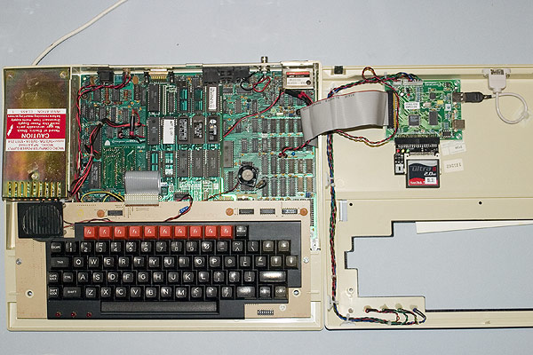 The BBC Micro with the case opened showing all the expansions fitted