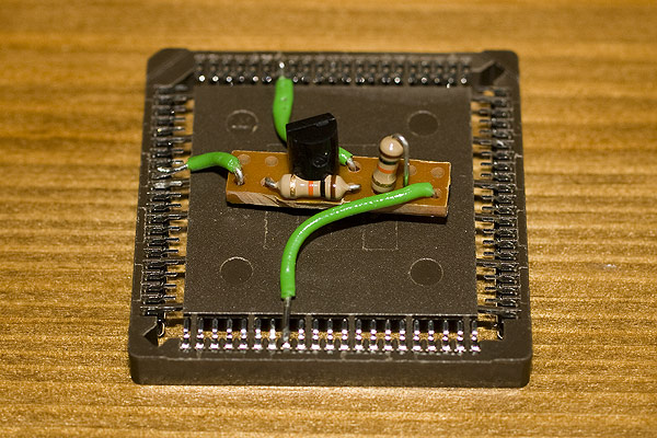 The reverse shot of the PCMCIA reset fix showing the two 10K resistors