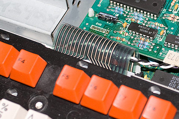 The A3000 keyboard ribbon cables connected to the motherboard