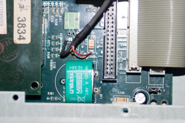 The battery re-fitted to the motherboard and umbilical connection in place