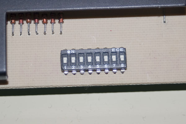 An 8-way DIL switch soldered onto the BBC Micro circuit board provides an easy method to change configuration settings